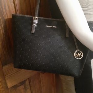New with tags Michael Kors TZ leather embossed zip tote. Black